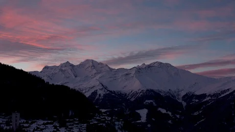 Timelapse of high altitude mountains and cloudy colorful sky during sunrise Stock Footage 121576519