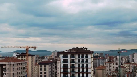 Timelapse of high angle view city scenery with running gray clouds in Kadikoy, Stock Footage 93208600