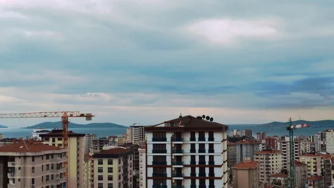 Timelapse of high angle view city scenery with running gray clouds in Kadikoy, Stock Footage 93208822