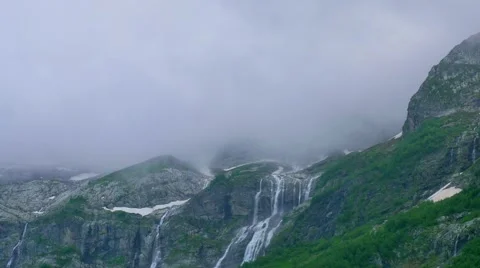 Timelapse of high mountain waterfall with clouds on a cloudy day. Kavkaz region 스톡 동영상 65773538