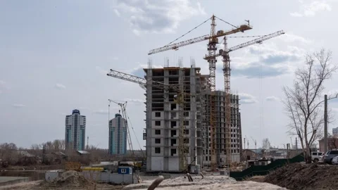 Timelapse of high rise building construction with several tower cranes work.. Stock Footage 335081873