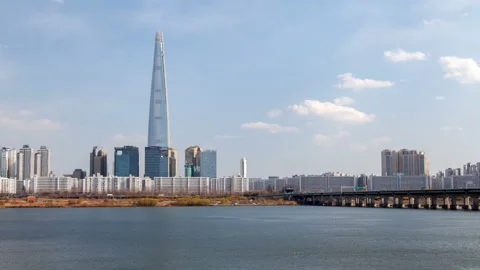 Timelapse highest skyscraper and Seoul buildings at river Stock Footage 117216291