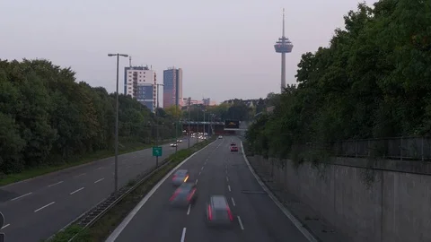 Timelapse of highway and cityscape at gray dim evening dusk Stock Footage 80311685