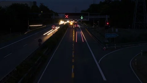Timelapse of highway and construction site at night Stock Footage 79733850