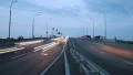 Timelapse of highway road junction, city vehicles pass lights on HD Footage