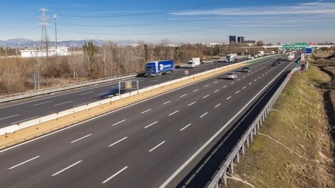 Timelapse of highway traffic in daylight with blue sky Stock-Footage 101328088