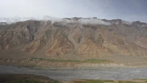 Timelapse of Himalaya mountains with clouds running on blue sky at Gondhla vi Stock Footage 201716474