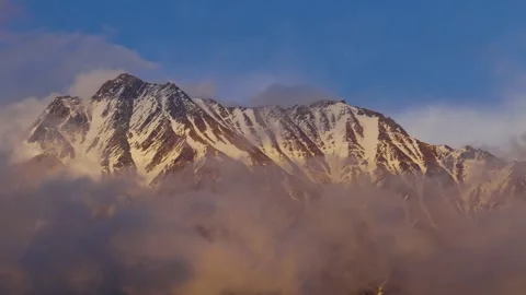 Timelapse of Himalayan mountain and drifting clouds with blue sky. The vide.. Stock Footage 279872101