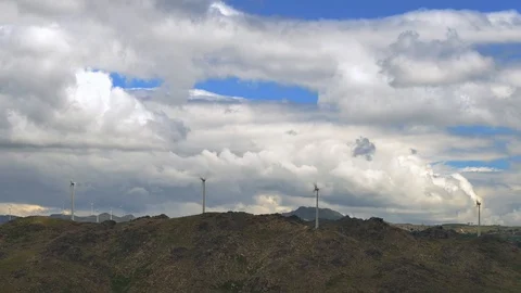 Timelapse of Horizontal-Axis wind turbines on top of a mountain range in Stock Footage 108872474
