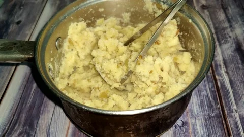 Timelapse of hot steam in a pan with boiled mashed potatoes Stock Footage 232219295