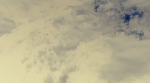 Timelapse - Hovering clear and dark clouds - disturbing atmosphere at dusk. Stock Footage 68344396