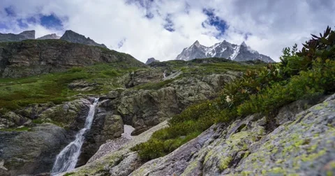 Timelapse how clouds cling to mountains Stock Footage 312786840