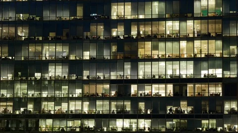 Timelapse of a huge corporate office building at night Stock Footage