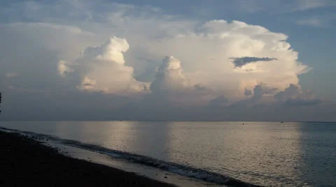 Timelapse of huge cumulus clouds over ocean Stock Footage 23631446