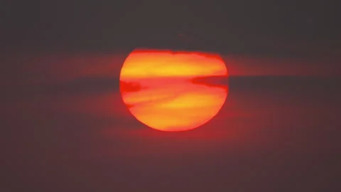Timelapse, huge round red sun in the sky, sunset Stock Footage 301393173