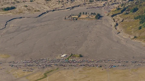 Timelapse of human activity using horse and jeep at base of Bromo Mountain 動画素材 90527553