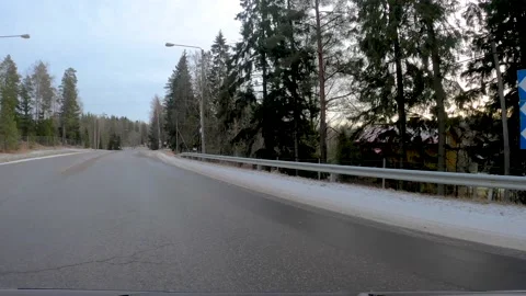 Timelapse hyperlapse FPV of car driving along snowy country roads in Finland Stock Footage 155065666