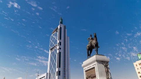Timelapse hyperlapse of skyscraper and horse statute, Santiago de Chile Stock Footage 100844493