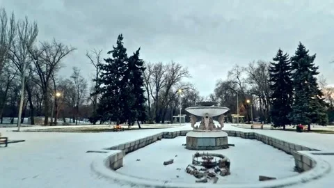 Timelapse hyperlapse transition from winter to summer city alley fountain Stock Footage 241182599
