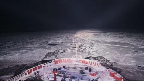 Timelapse of Icebreaker Ship Break Through Ice in the night Stock Footage 139956416