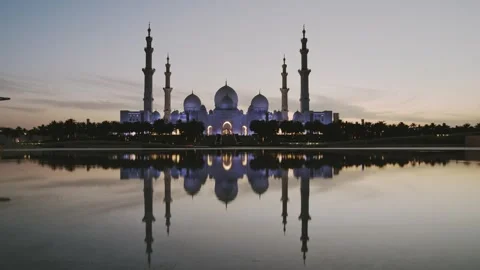 Timelapse illuminated cinematic Sheikh Zayed Grand Mosque at sunset, Abu Dh.. Stock Footage 309839841