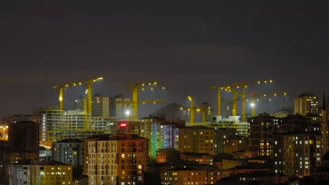 Timelapse: illuminated cranes moving over Istanbul construction sites Stock Footage 341285684