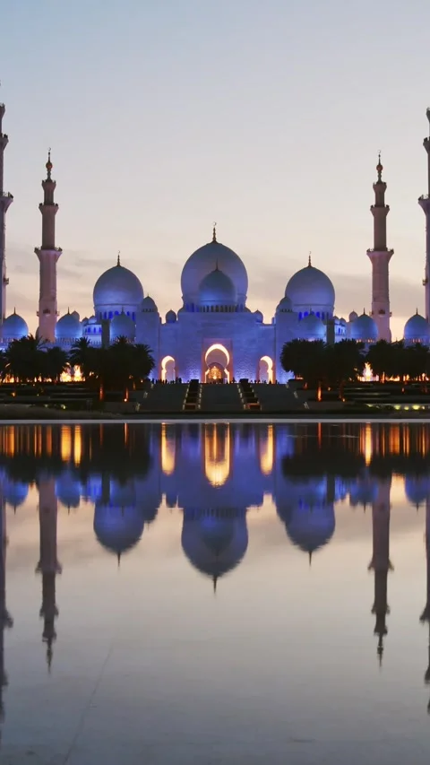 Timelapse illuminated stunning Sheikh Zayed Grand Mosque at sunset, Abu Dha.. Stock Footage 309806726