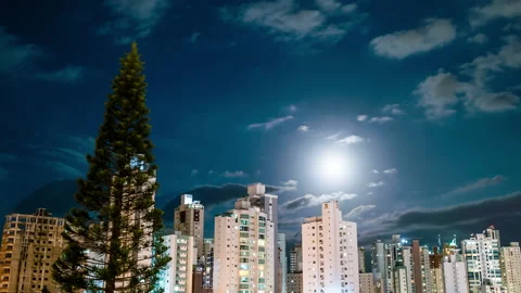Timelapse image of night with full moon at Balneário Camboriú, Brazil. Video stock 193616494