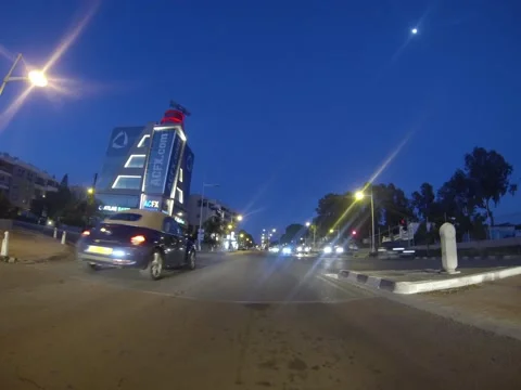 Timelapse of inside car point of view driving around city Stock Footage 132444548