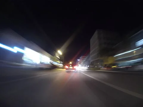 Timelapse of inside car point of view driving around city Stock Footage 132444645