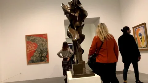 Timelapse inside Tate Modern Gallery. People visiting an art exposition. London Stock Footage 99923111