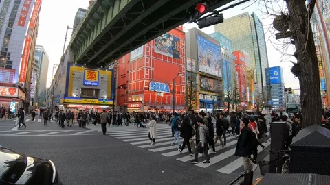 Timelapse of intersection by the famous Sega building in Japan. Stock Footage 128939252