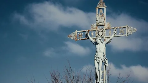 A timelapse of Jesus on the cross with rolling clouds in the background Stock Footage 152047416