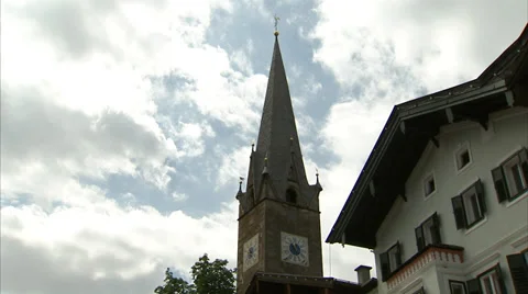Timelapse of Kitzbühel church tower Stock Footage 34862233
