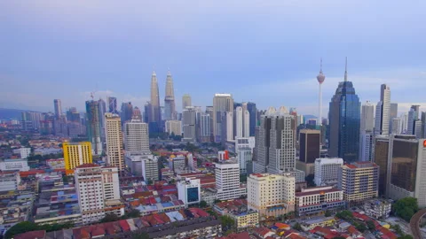 Timelapse of Kuala Lumpur city during sunrise. Tilt Down effect. Video stock 201275367