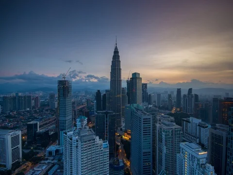 Timelapse of Kuala Lumpur skyline during sunrise Stock Footage 72463312