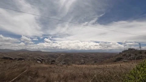Timelapse of lagoon with mountains and clouds in the background. Stock Footage 229582769