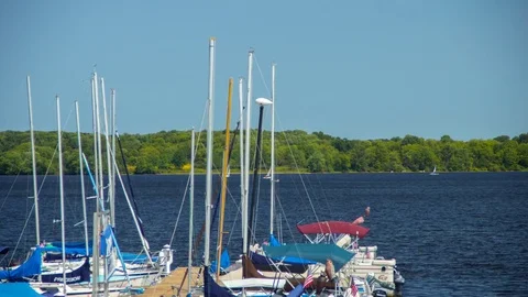 Timelapse of Lake Docks with Sailboats Stock Footage 70397902
