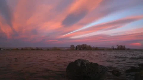 Timelapse of lake shore sunset clouds Stock Footage 33751668