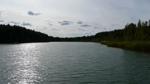Timelapse lake sky forest clouds running 스톡 동영상 114417126