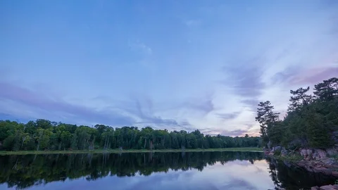 Timelapse of a lakefront with trees in Calgary Stock Footage 87367216