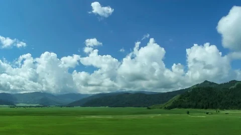 Timelapse landscape with clouds moving over mountains Stock Footage 72360493