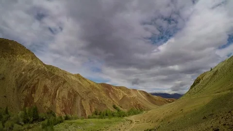 Timelapse landscape with clouds moving over mountains - Altay Russia, 4k Stock Footage 79229082