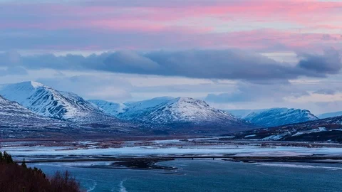 Timelapse landscape of snow mountain during sunset time at akureyri iceland. Video stock 88402875