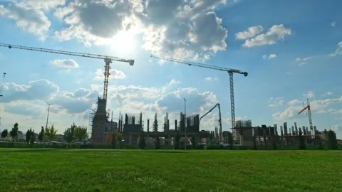 Timelapse of Large Construction Site with Active Tower Cranes Building Video stock 345961275