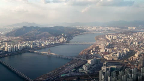 Timelapse large winding river flows between Seoul districts Stock Footage 117217026