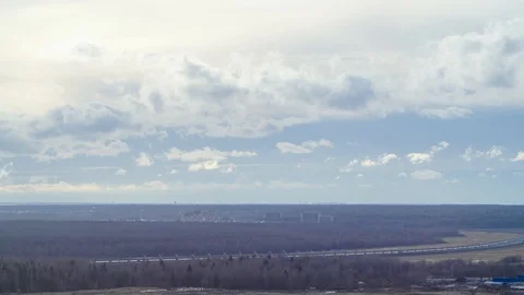 Timelapse layered clouds with countryside landscape Stock Footage 126559996