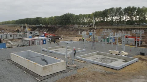 Timelapse of laying foundation of electrical substation Stock Footage 203311699