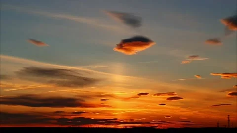Timelapse of lenticular clouds at sunset Stock Footage 220089291