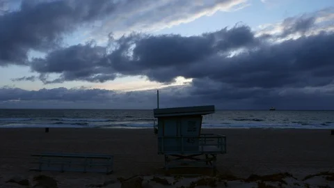 Timelapse Lifeguard Tower Facing Oncoming Storm Stock Footage 100375027